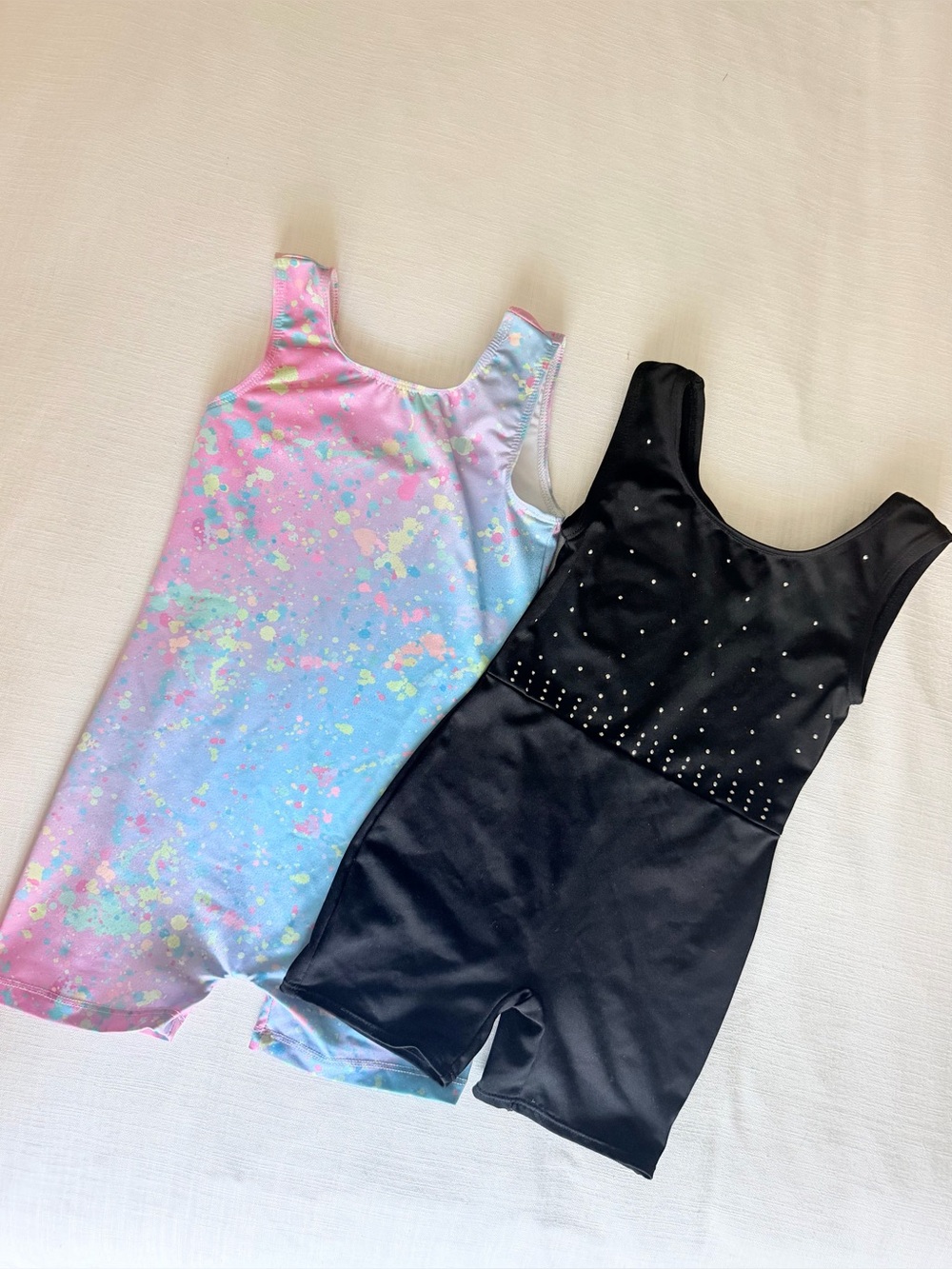 Bundle girls leotards black sparkle and neon paint splatter size 4/5 xs